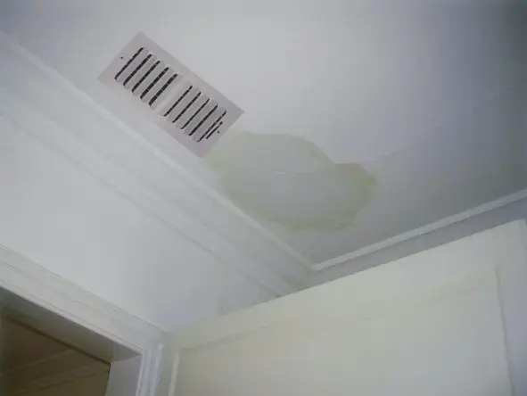 Water stain on a ceiling beside an air conditioning vent in El Monte